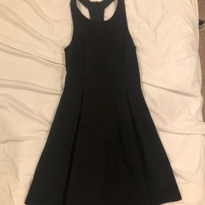 Adorable little black dress with cutout back